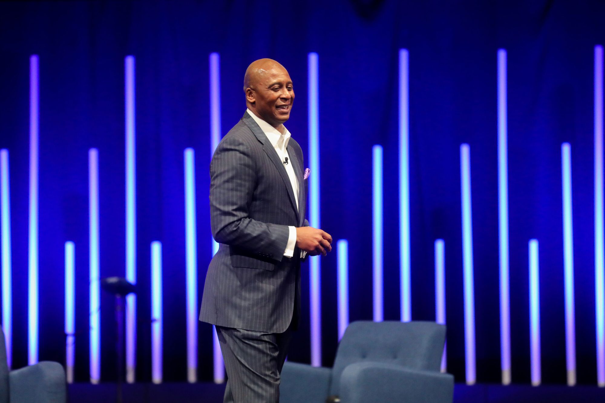 Dr. Samuel Jones delivering a keynote on stage